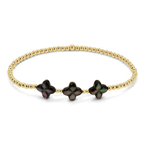 Gold Beads and Black Flowers