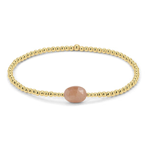 Gold Beads and Light Pink Gem