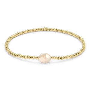 Gold Beads and Taupe Gem