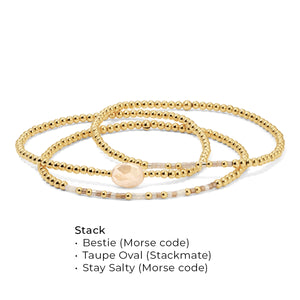 Gold Beads and Taupe Gem